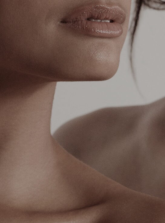 Close-up of a person with a naturally defined and beautifully sculpted chin, enhancing facial harmony